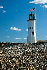 Scituate Lighhouse on Rocky Shore in Massachusetts